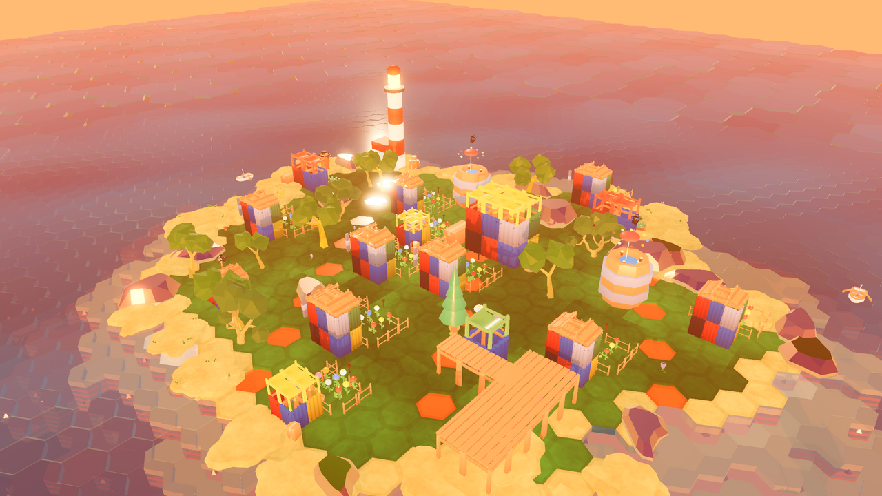 A built-up coastal town glowing at sunset